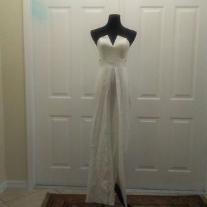 White Strapless jumpsuit w/ cut outs